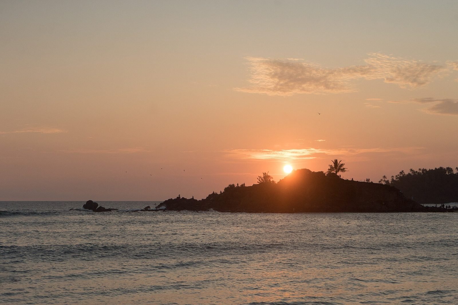A private catamaran at sunset